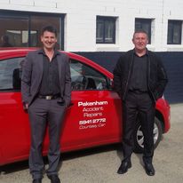 Pakenham Accident Repairs team members with a company car